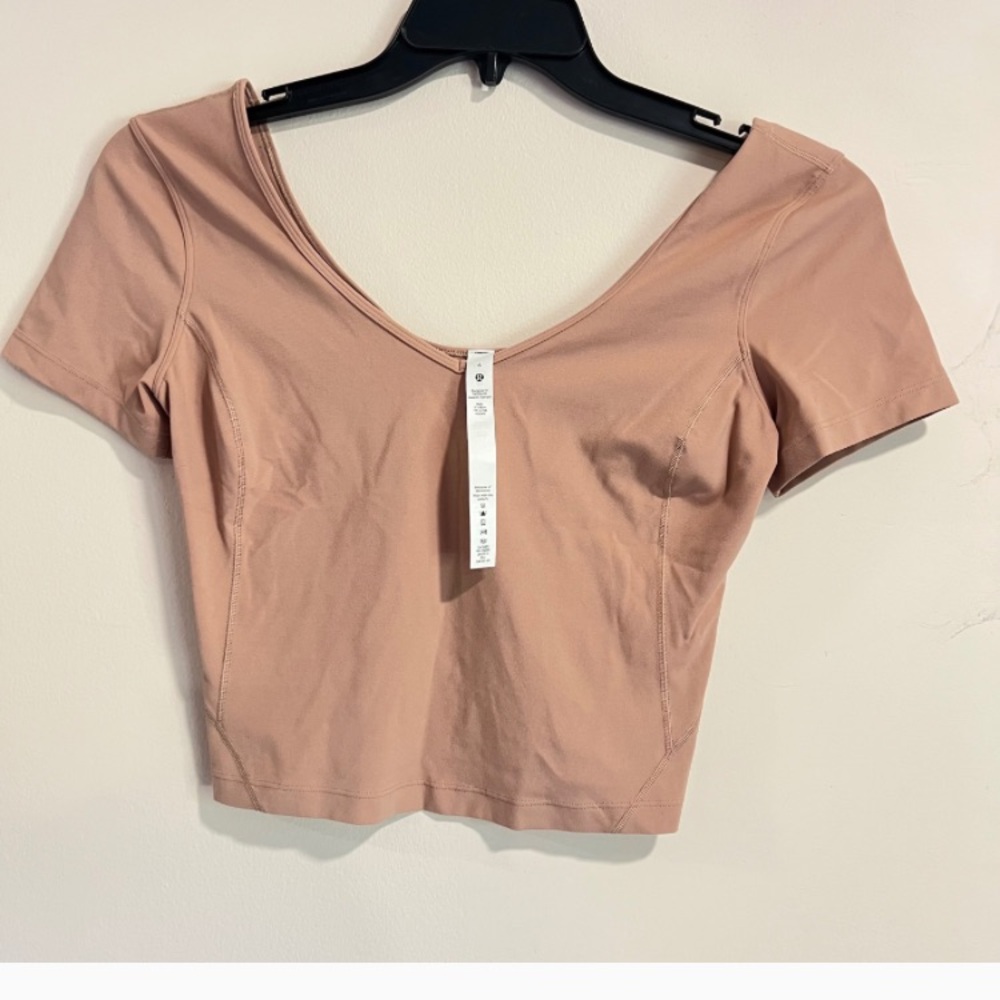 Lululemon align cropped tee in pink sand color(nude/beige) Size 6. NWOT